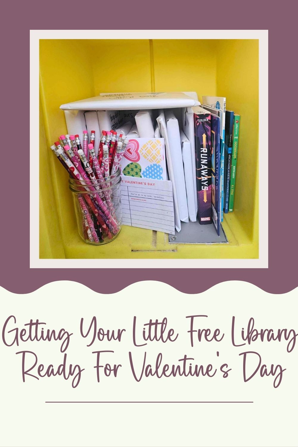 the inside of a little free library decorated for valentines day